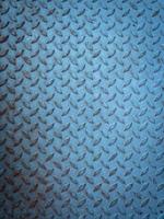 Blue steel plate texture background with diamond pattern. photo