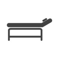 cama de masaje glifo icono negro vector