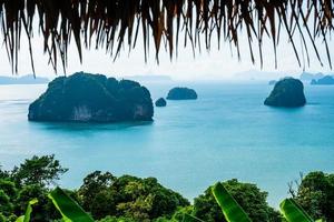 aerial view of Phi Phi Island with Maya Bay and Phi Leh Lake, Krabi Province, Top view of a rocky tropical island isolated with turquoise water and white beach, Thailand. photo