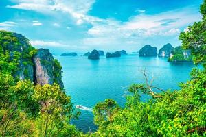 aerial view of Phi Phi Island with Maya Bay and Phi Leh Lake, Krabi Province, Top view of a rocky tropical island isolated with turquoise water and white beach, Thailand. photo