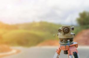 road construction site, theodolite instrument for road construction photo