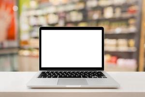 pharmacy store with laptop computer on medical counter photo