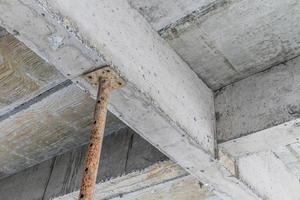 building under construction with iron steel support concrete beams photo