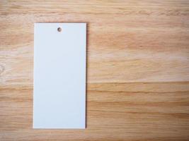 blank price label on wood background photo