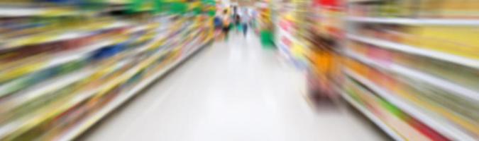 supermarket aisle with motion blur photo