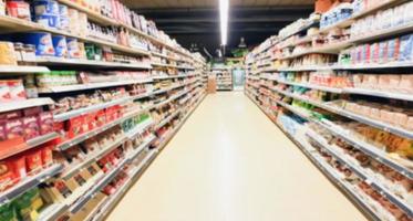 supermarket aisle interior blurred background photo