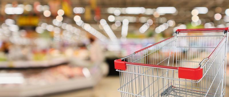 supermarket grocery store with fruit and vegetable shelves interior  defocused background with empty red shopping cart 8317886 Stock Photo at  Vecteezy