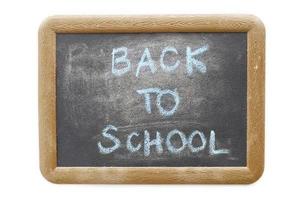 back to school text on chalkboard isolated on white background photo