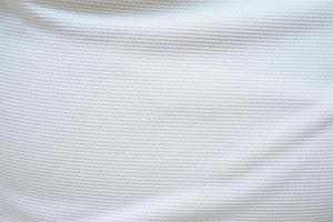 White football jersey clothing fabric texture sports wear background photo