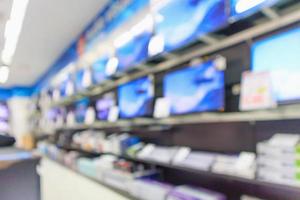 eletronic department store show Television TV and home appliance with bokeh light blurred background photo