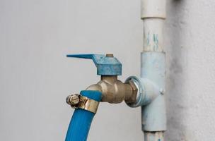 water tap with rubber line photo