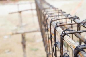 New House building construction site with rebar steel to reinforced concrete photo