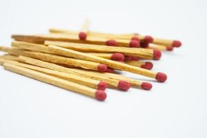 Matches on white background photo