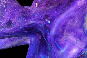Abstract violet liquid drop on black background in the science and futuristic style photo