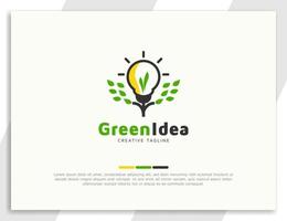 diseño de logotipo de ilustración de bombilla y hojas verdes vector