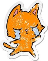 distressed sticker of a crying cartoon cat vector