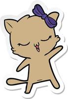 sticker of a cartoon cat with bow on head vector