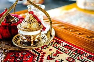 Turkish coffee and tea set in colorful traditional housewares in Turkish theme coffee cafe photo