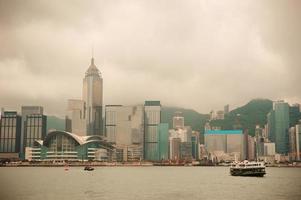 Hong Kong skyline with boats photo