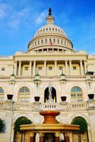 Capitol hill building with fountain, Washington DC photo