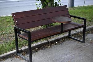 Chairs and a bench in the yard of the store photo