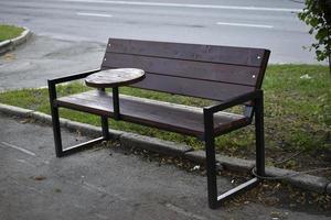 Chairs and a bench in the yard of the store photo