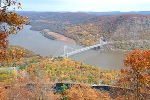 Autumn bridge with colorful trees photo