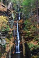 Autumn Waterfall in mountain photo