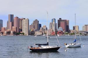 Urban city skyline with boat photo