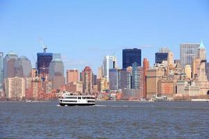 New York City Manhattan skyscrapers and boat photo