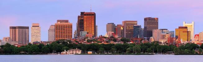 Urban skyscrapers over river photo