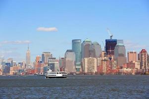 New York City Manhattan skyscrapers and boat photo