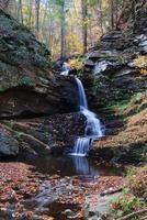 Autumn Waterfall in mountain photo
