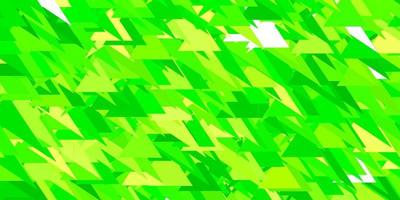 Light green, yellow vector background with triangles.