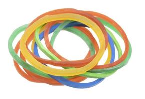 Multicolor rubber bands isolated on white background photo