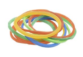 Multicolor rubber bands isolated on white background photo