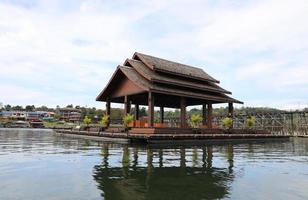 Wooden pavilion near Mon bridge the Thailand's longest wooden bridge, Kanchanaburi, Thailand. photo