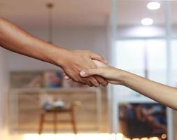 Elder hands hold child hands photo