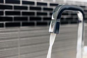 Water flow pass faucet photo