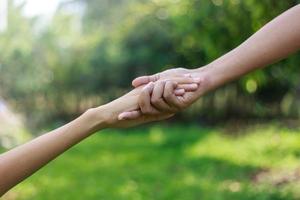 Family support - father and son hands photo