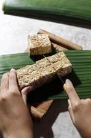 Tempeh Semangit or Tempe Bosok, Ingredient Making Sambal Tumpang Kediri. Tempe Busuk is Rotten Fermented Soy Bean photo