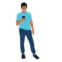 Portrait of a indian guy in full growth with a phone in his hand, vector isolated on a white background, the guy looks at the smartphone