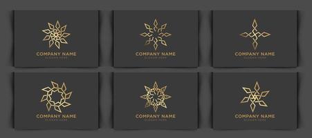 Vector set of logo design templates in trendy linear style with flowers and leaves - signs made with golden foil on black background