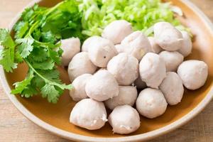 pork meatball with vegetable and spicy sauce photo