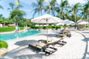 abstract blur bed pool around swimmimg pool in luxury hotel resort for background photo