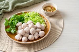 pork meatball with vegetable and spicy sauce photo