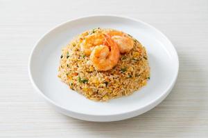 fried shrimps fried rice on plate photo