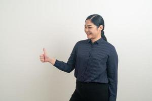 Asian woman with thumb up white background photo