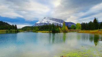 Snow Mountain and lake with Autumn foliage video