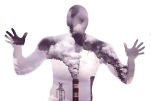 Concept of air pollution affecting humans. silhouette suffering from pollution photo